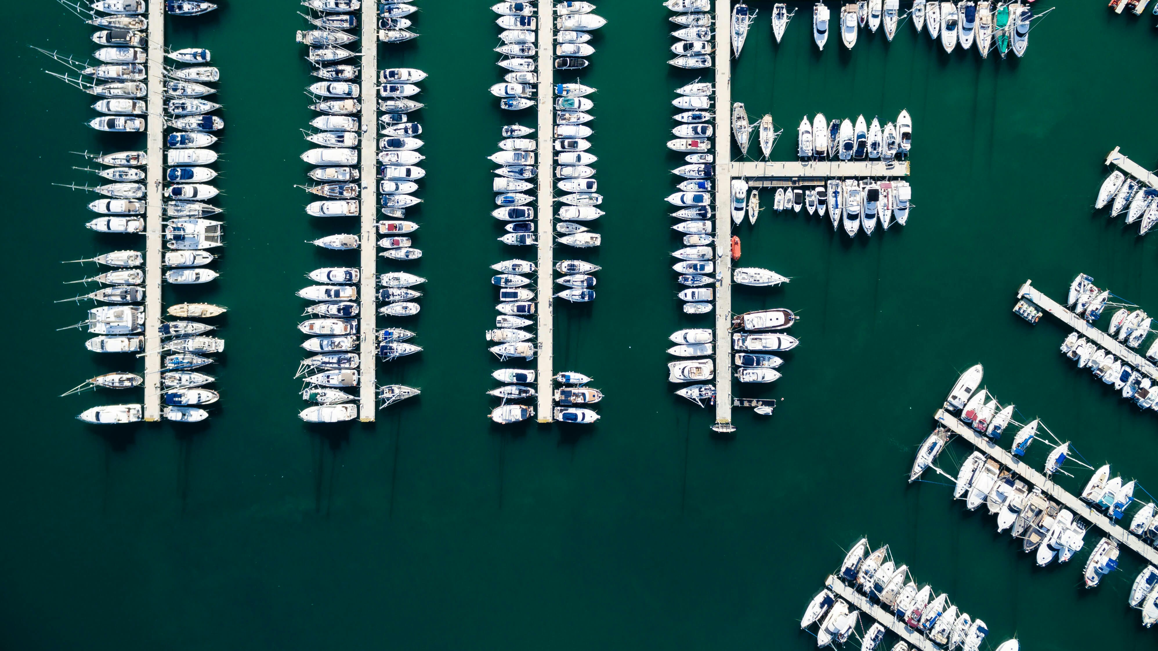 bird's eye view photo of yacht near dock